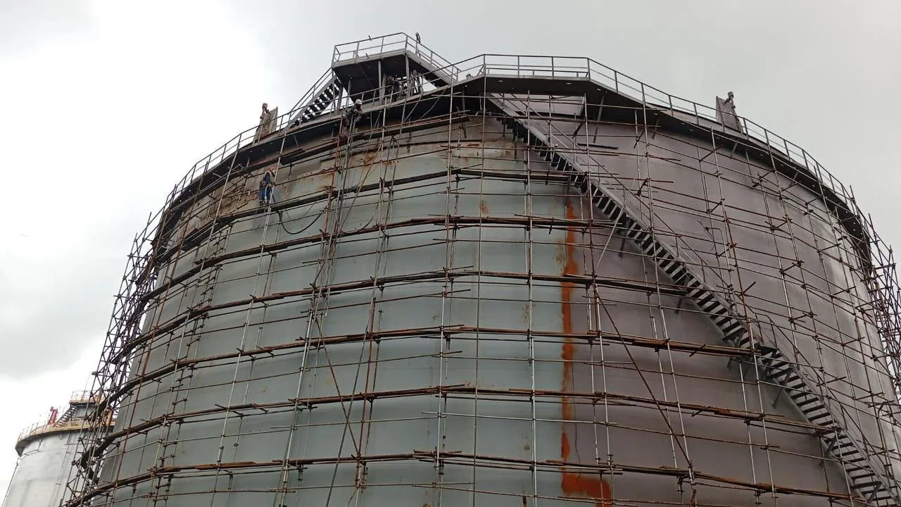 Scaffolding erected around a storage tank shell for rehabilitation